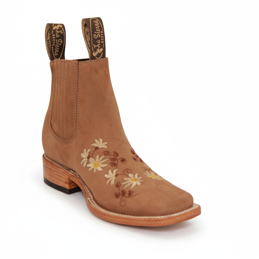 Brown Chelsea boot with floral embroidery on a white background